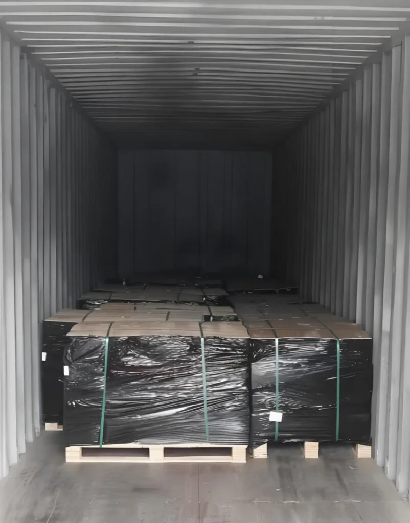 Palletized bearing units, securely shrink-wrapped and strapped, loaded inside a shipping container for export.