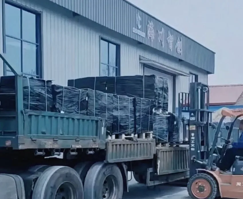 Forklift loading bearing onto truck